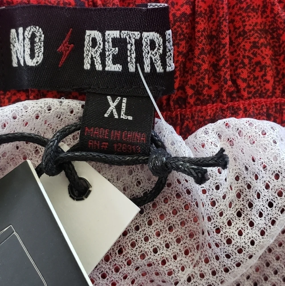 No Retreat swim trunks